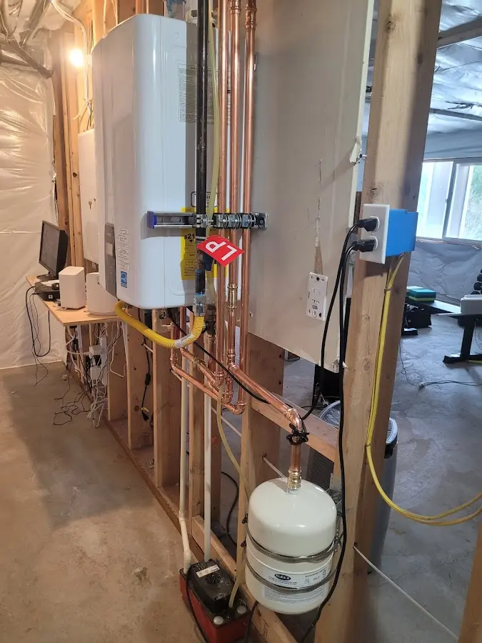 Licensed plumber repairing a kitchen sink in McFarland