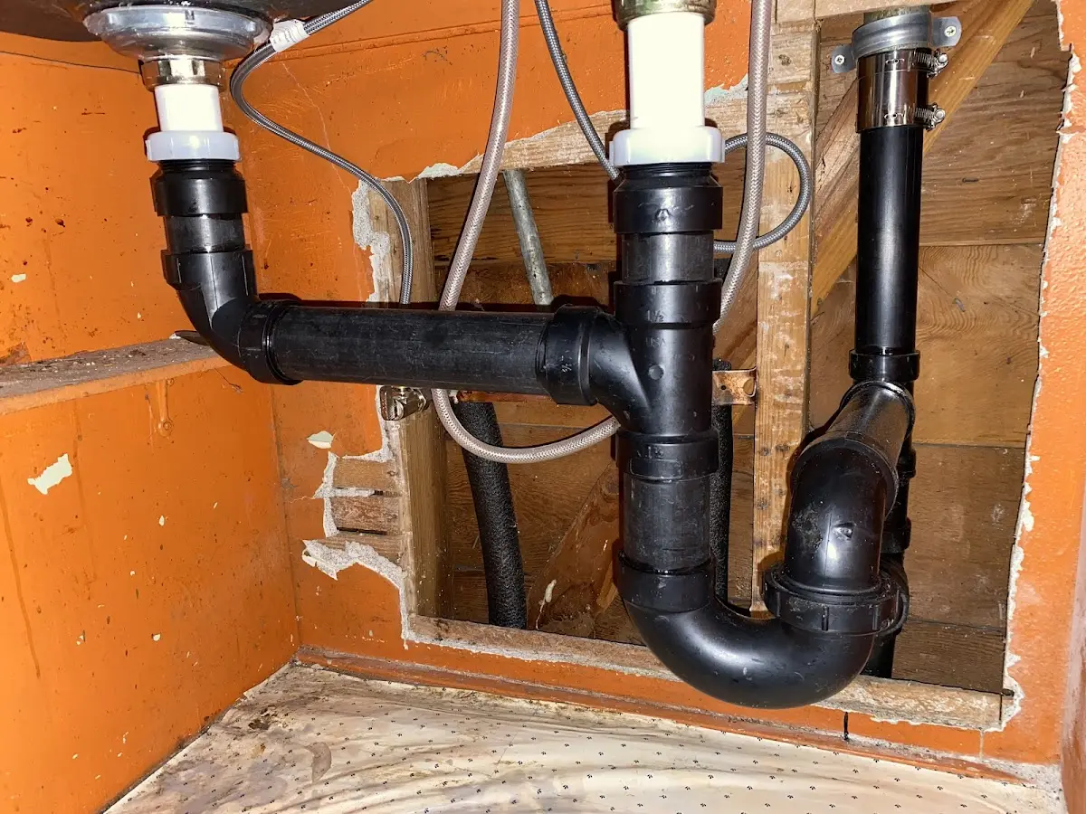 Professional Garbage Disposal Repair equipment and tools on the job in McFarland